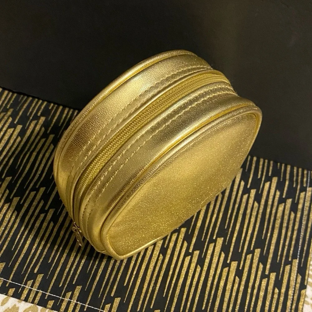 DIOR GOLD ZIPPER POUCH